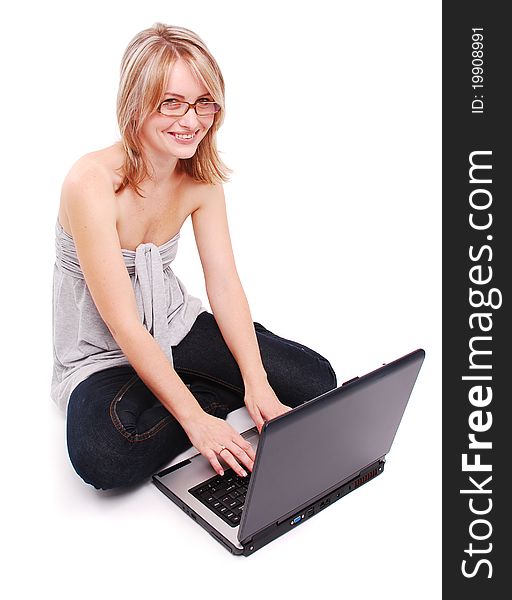 Beautiful young girl working on laptop