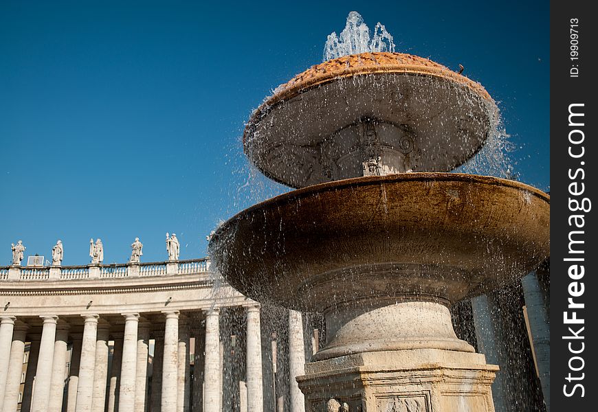 A fountain and an ancient building of the Roman Empire, Italy