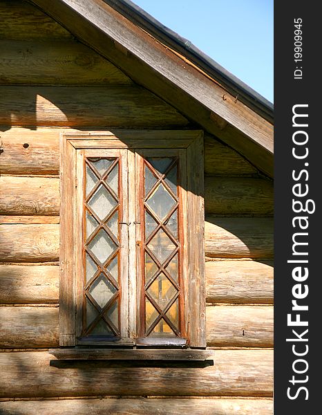 Traditional old window of rural wood house