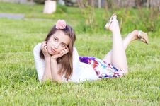 Dreaming Girls Rest On The Green Grass Stock Images Dreaming Girls Rest On The Green Grass Stock Images