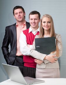 Two Men And Woman Working With A Computer Royalty Free Stock Images Two Men And Woman Working With A Computer Royalty Free Stock Images