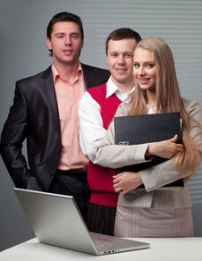 Two Men And Woman Working With A Computer Royalty Free Stock Images Two Men And Woman Working With A Computer Royalty Free Stock Images