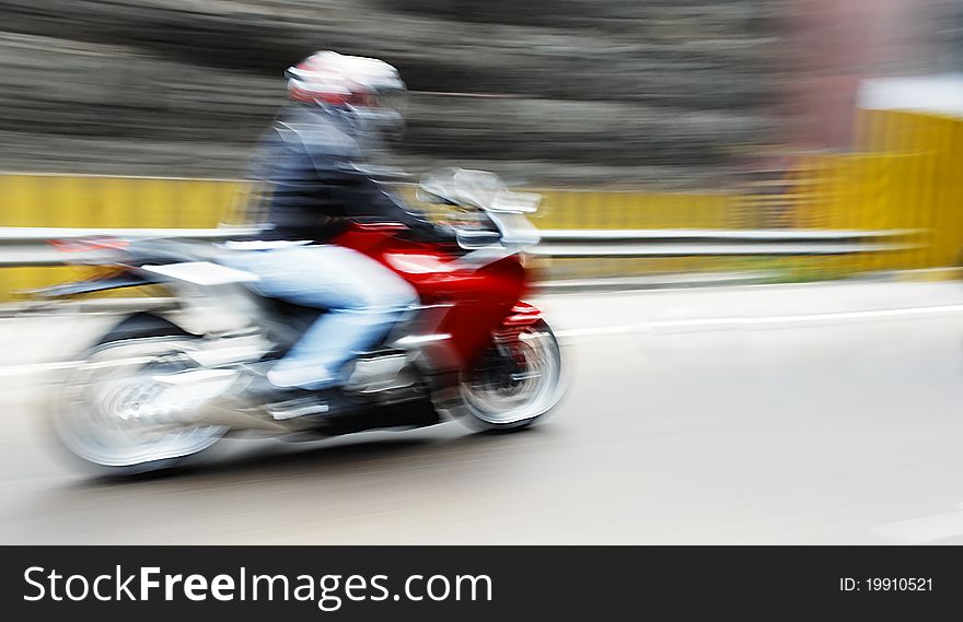 Red superbike motorcycle motion blur. Red superbike motorcycle motion blur