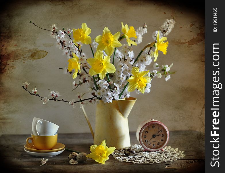 Bouquet of narcissuses and flowering apricots, alongside quail eggs. Bouquet of narcissuses and flowering apricots, alongside quail eggs