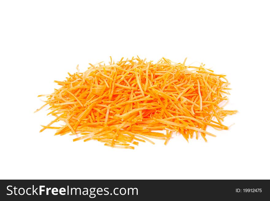 Healthy grated carrots isolated over white background. Healthy grated carrots isolated over white background