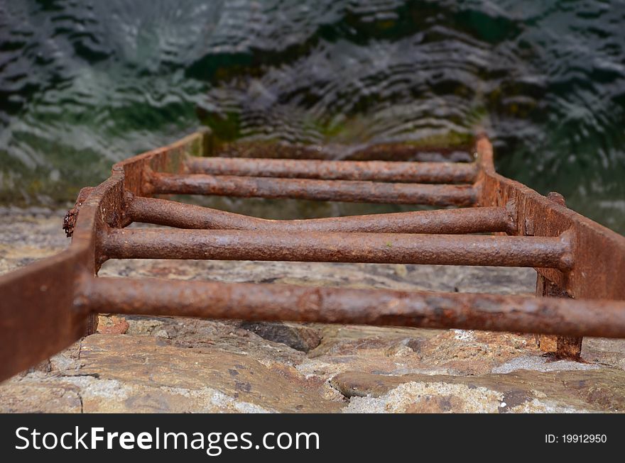 Fishermans ladder going directly into the river