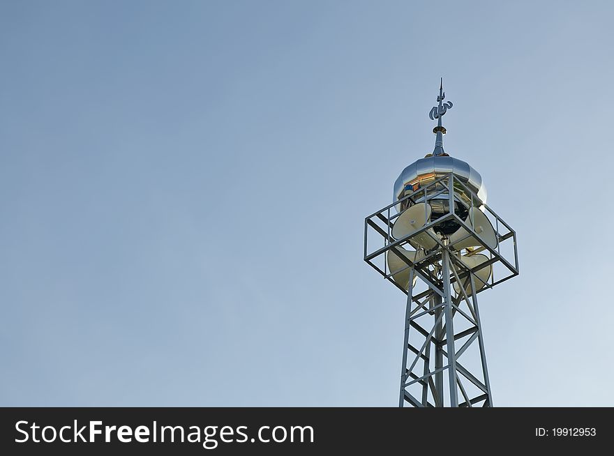 Mosque tower with blue sky background in the outdoor