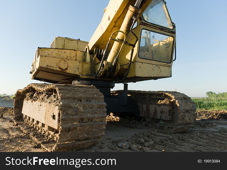 Digger, Heavy Duty construction equipment parked at work site