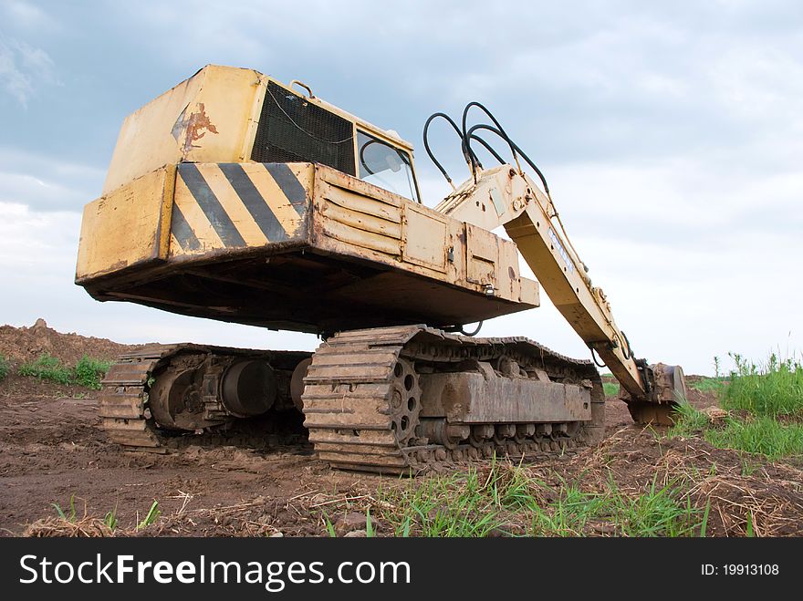 Digger, Heavy Duty construction equipment parked at work site