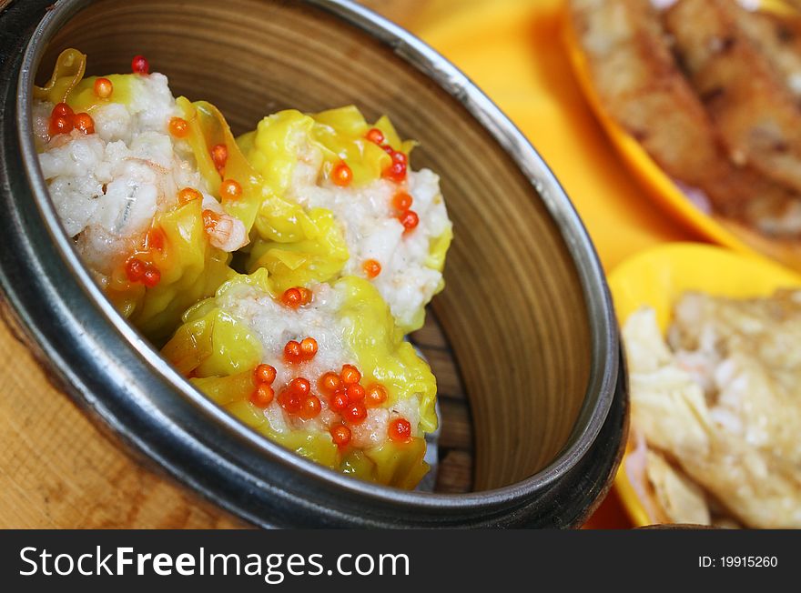 Chinese Shrimp Dim Sum with Fish Egg in Bamboo Basket