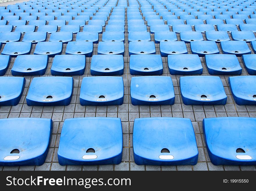 Abstract image in stadium with colorful chairs. Abstract image in stadium with colorful chairs.