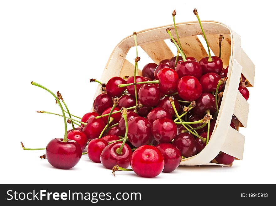 Scattered cherries isolated on white