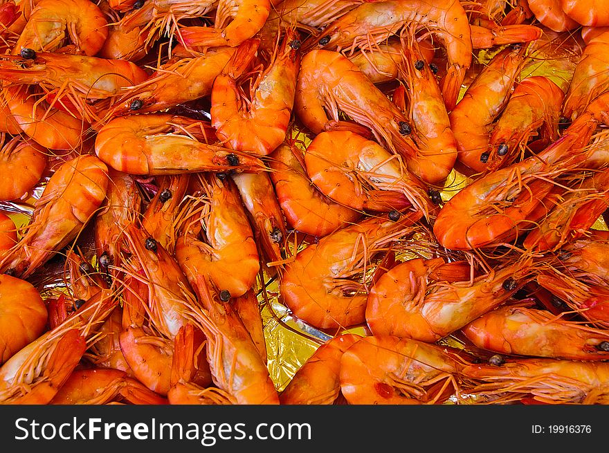 Fresh Shrimp and Prawns in a pile on a market stand