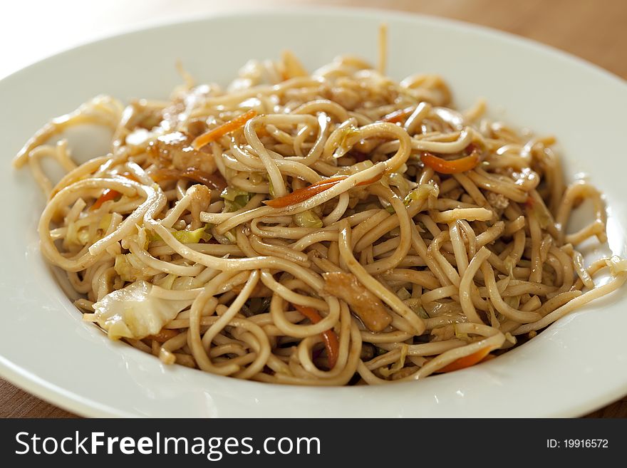 Fry noodles with chicken meat and vegetable