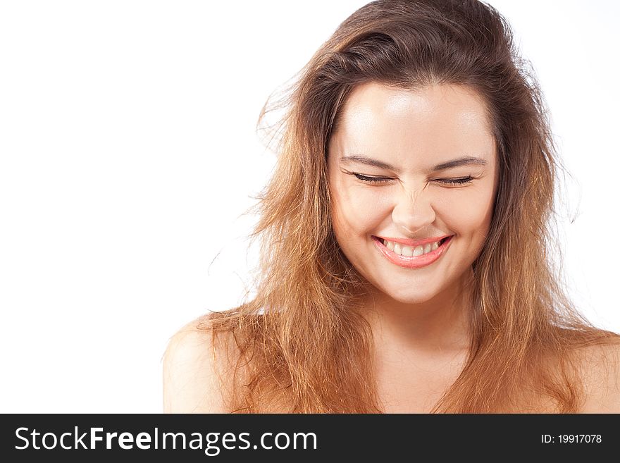 Beautiful happy smiling young woman with closed eyes