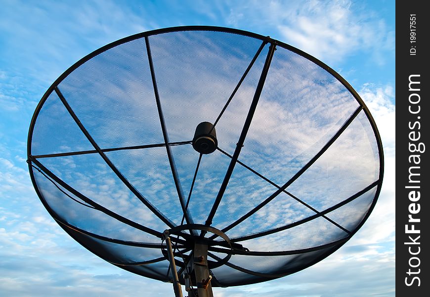 Satellite dish antennas under blue sky