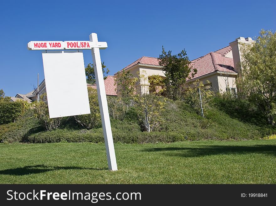 Blank for sale sign that includes a huge yard. Blank for sale sign that includes a huge yard.