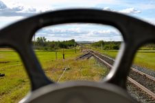 Railway Tracks Through The Railcars Stock Photos