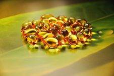 Yellow Pills On Green Background Royalty Free Stock Image Yellow Pills On Green Background Royalty Free Stock Image