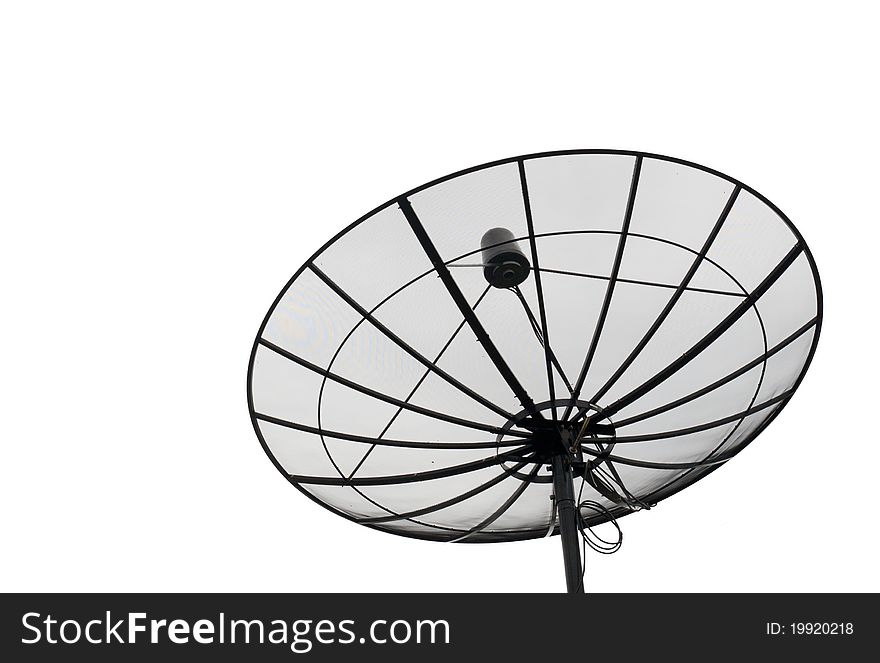 Satellite dishes under a black sky and fluffy clouds isolated. Satellite dishes under a black sky and fluffy clouds isolated