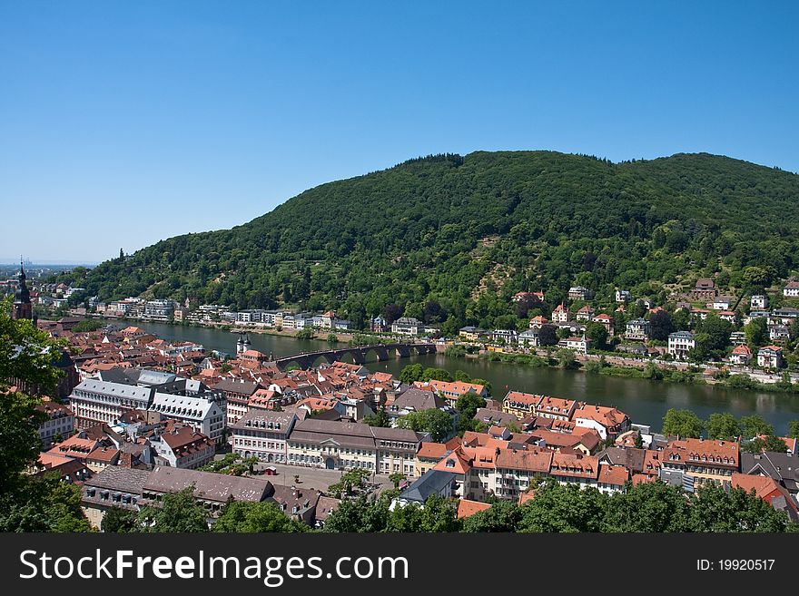 View of Heidelberg, Germany with Neckar River and Bridge.