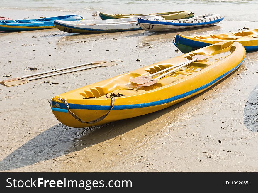 Old Colorful kayaks on the beach