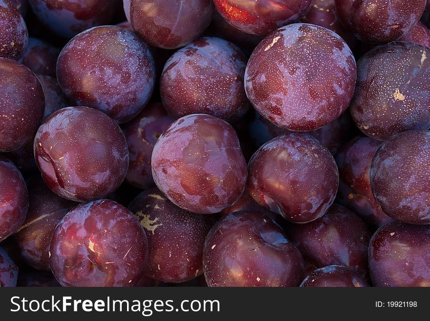 Organic Plums at a Market