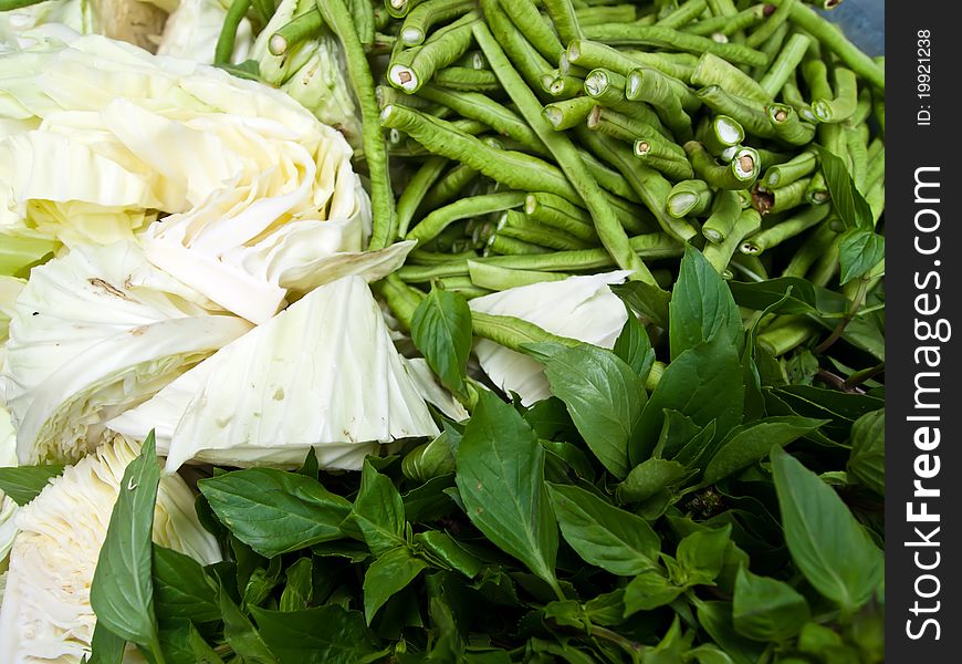 Thai vegetables for thai food for Lahb (Thai Spicy minced Salad) is a popular Thai salad dish (Thai Basil , Cabbage , Cowpea)