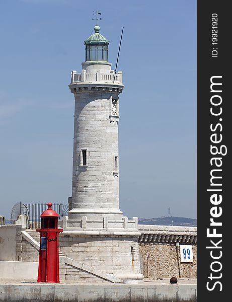 Stone lighthouse at the entrance of Marseille harbor. Stone lighthouse at the entrance of Marseille harbor