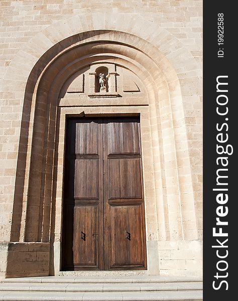 Entrance doors in an old cathedral, raw. Entrance doors in an old cathedral, raw