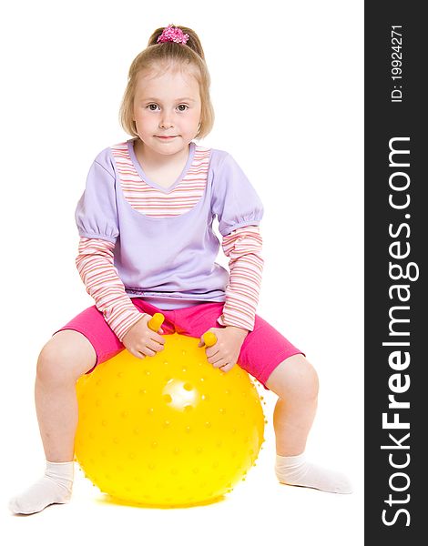 Girl with a ball on a white background.