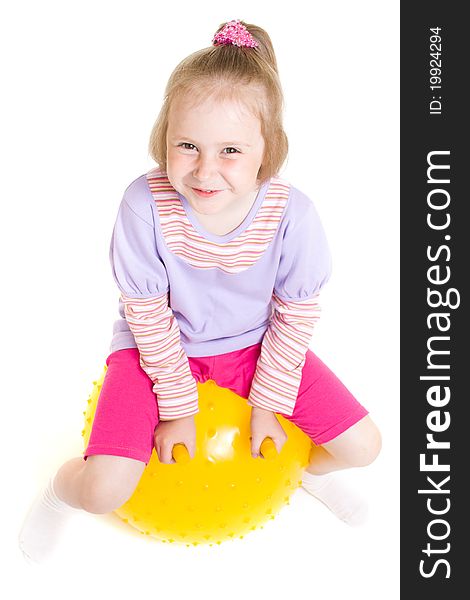 Girl with a ball on a white background.