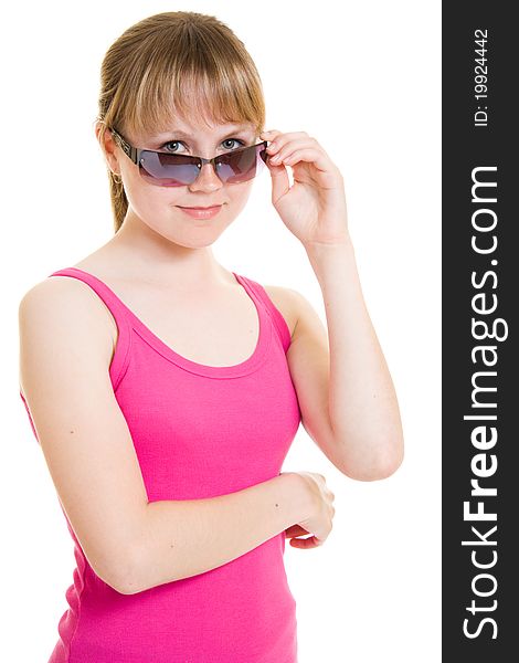 Teen in sunglasses on white background.