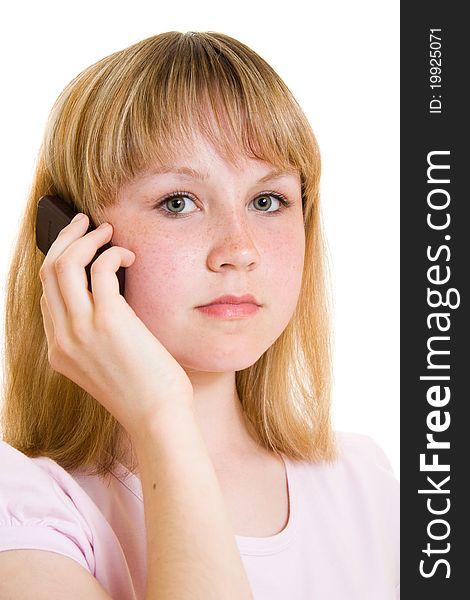 The girl with the phone on a white background. The girl with the phone on a white background.