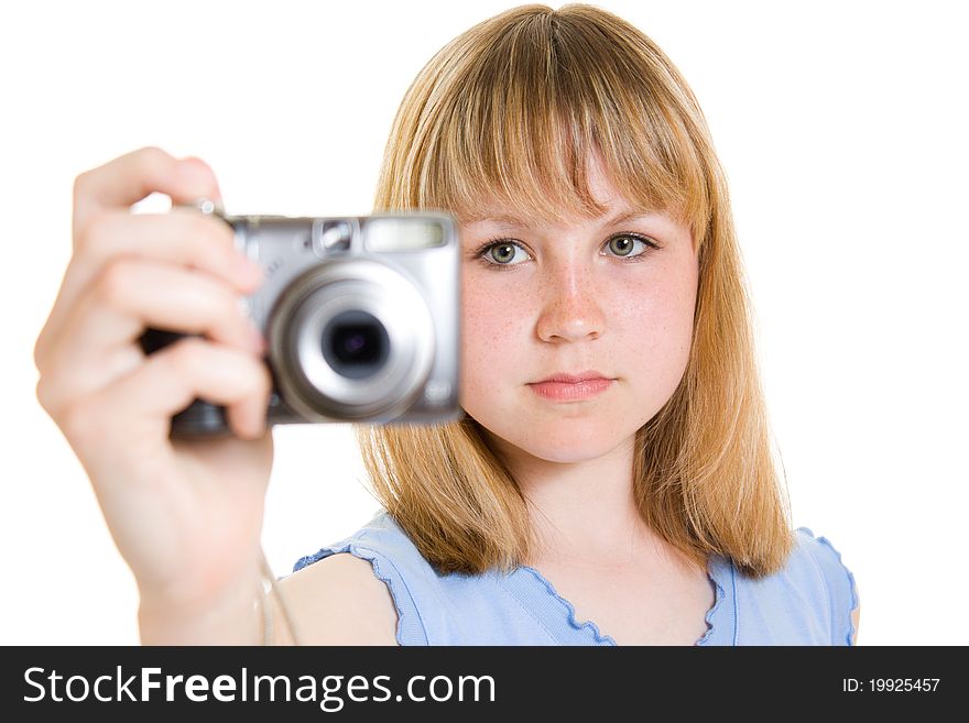 A teenager with a camera on a white background.