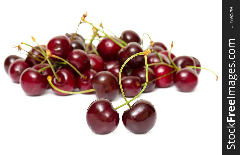Fresh cherries isolated on white