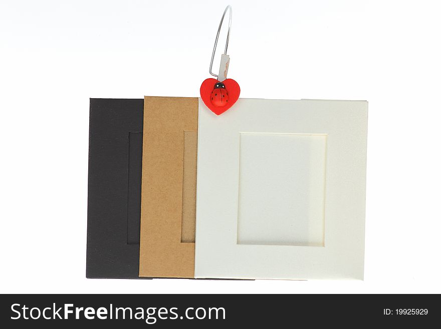 Picture frame empty color paper on white background