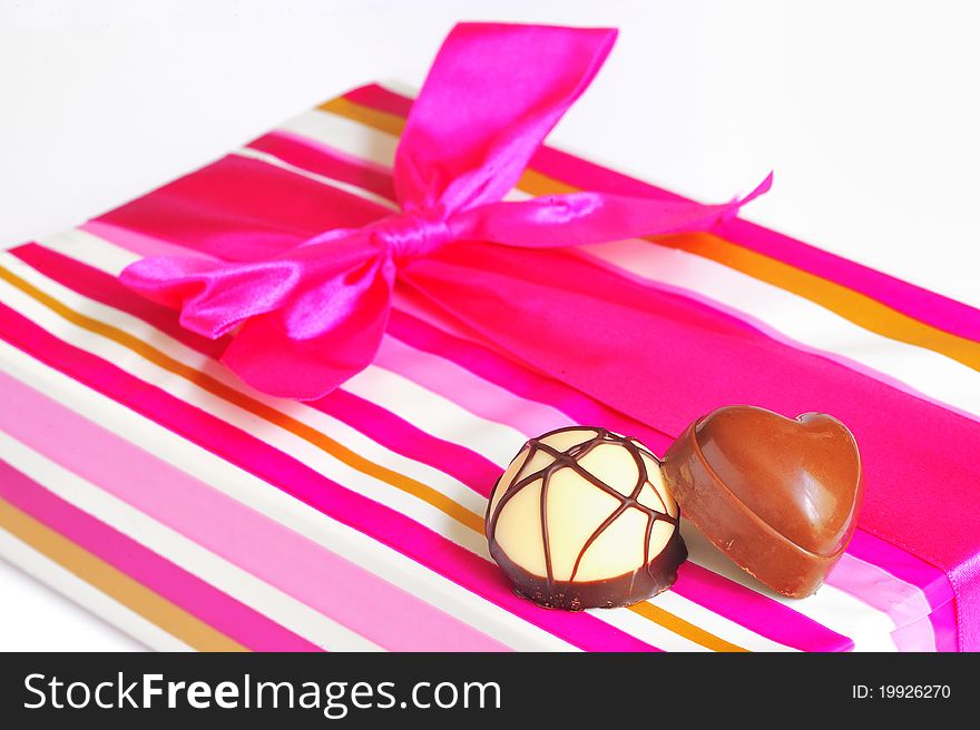 Chocolate candies and gift box isolated