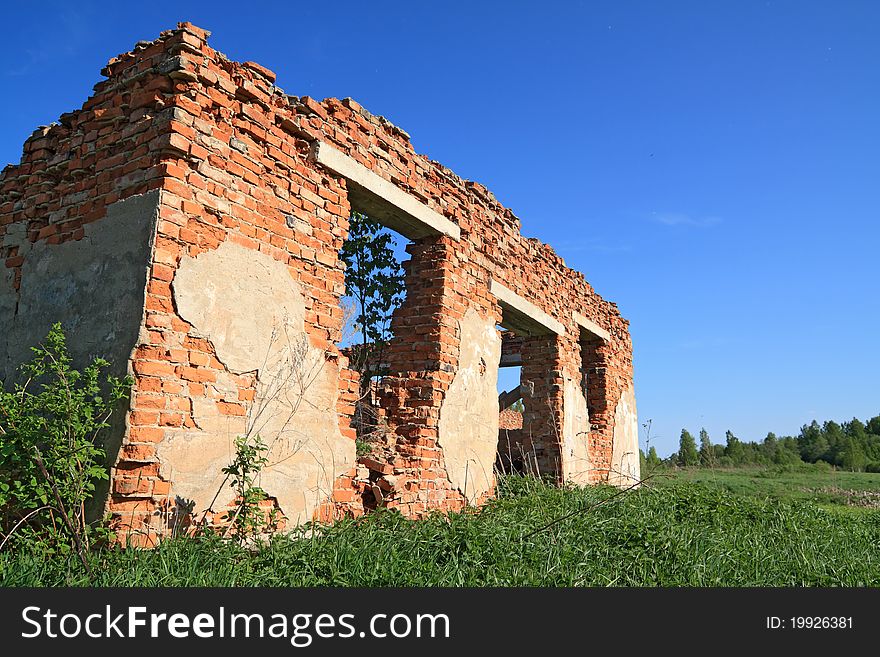Ruined brick house in the meadow. Ruined brick house in the meadow