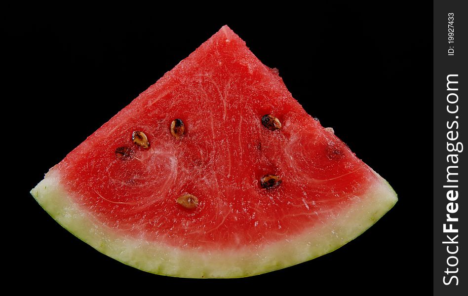 Single water-melon on dark background. Isolated