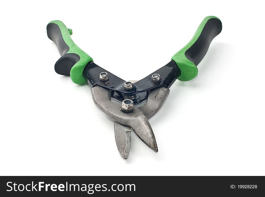 Scissors building with green handles on a white background