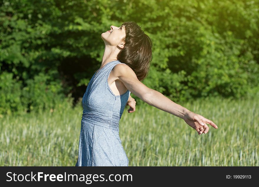 Bright portrait of a young happy woman outdoor. Bright portrait of a young happy woman outdoor