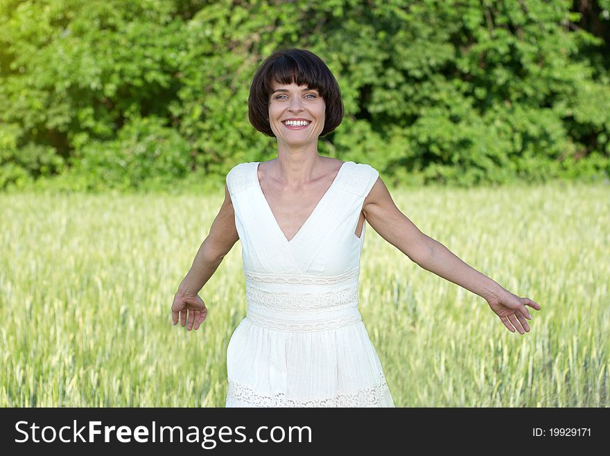 Bright portrait of a young happy woman outdoor. Bright portrait of a young happy woman outdoor