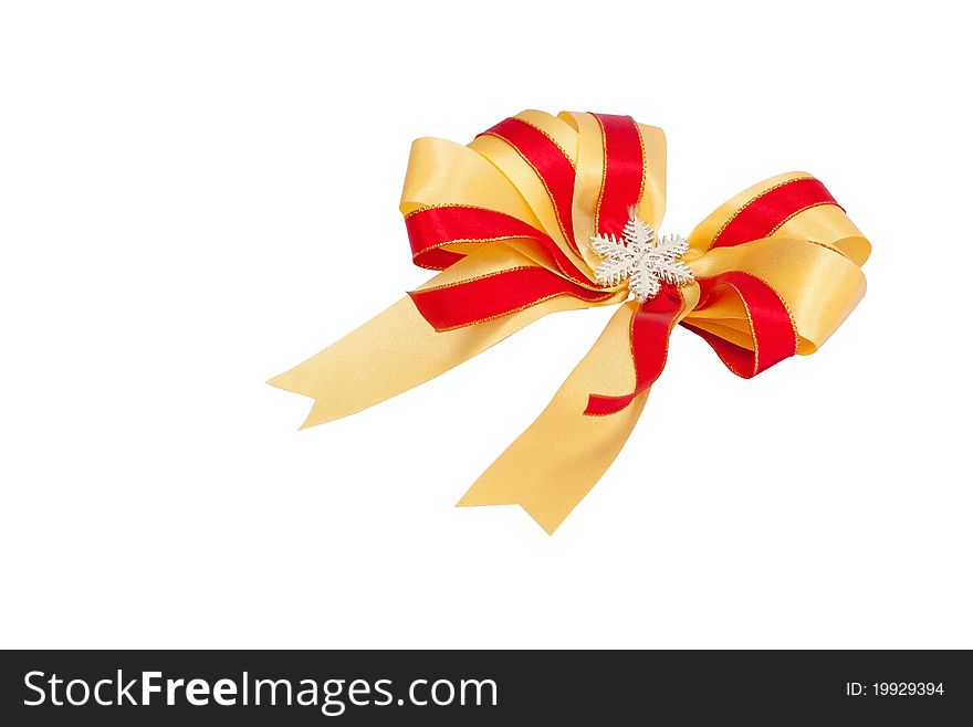 Gold ribbon bow on the white background