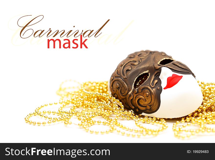 Ornate carnival mask from Venice with bead and with place for your text on the top. Ornate carnival mask from Venice with bead and with place for your text on the top