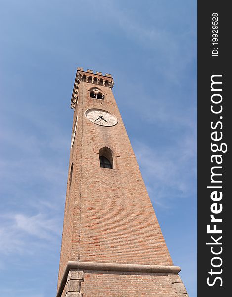The clock tower (Campanone) in Santarcangelo di Romagna, Italy. This neogothic tower was built in 1893 and is one of the most characteristic building of this small town. The clock tower (Campanone) in Santarcangelo di Romagna, Italy. This neogothic tower was built in 1893 and is one of the most characteristic building of this small town.