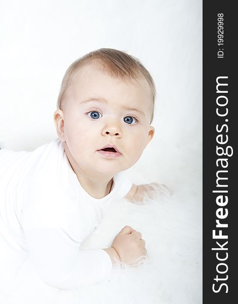 Adorable baby girl on white background