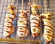 Skewered Squid On Wooden Sticks Grilled Tentacles Stock Photo Skewered Squid On Wooden Sticks Grilled Tentacles Stock Photo
