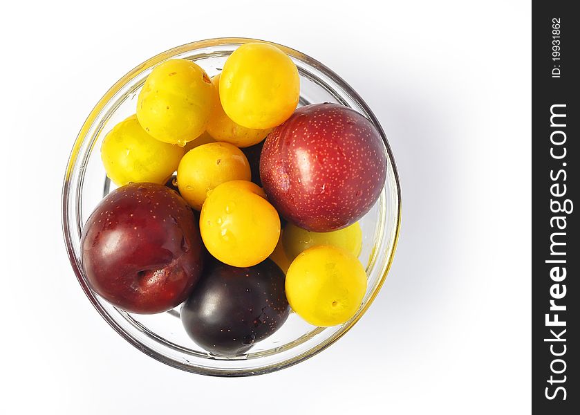 A mixture of fresh prunes of different colors, size and taste. A mixture of fresh prunes of different colors, size and taste