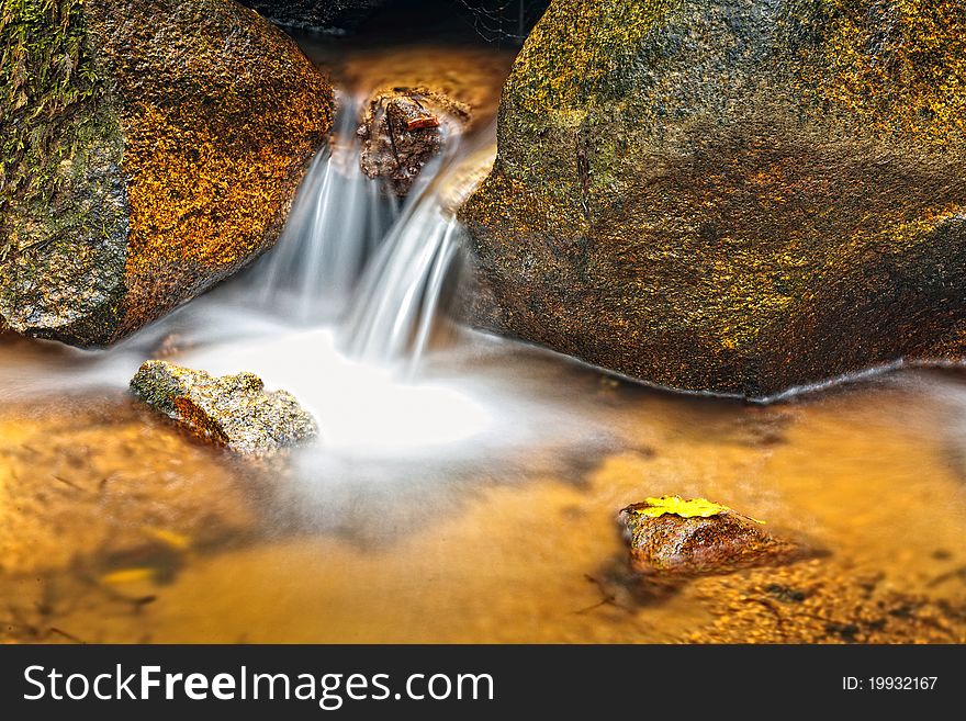 Small natural waterfall in the National Park Sintra-Cascais. Small natural waterfall in the National Park Sintra-Cascais.